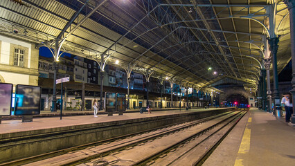Train at platform of Sao Bento Train Station timelapse in Porto, Portugal.