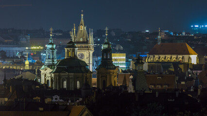 Prague night timelapse, fantastic old town roofs during twilight with towers and night...