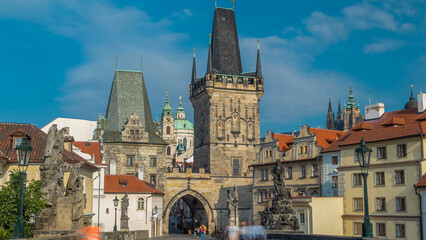 A view along Charles Bridge in Prague towards the Lesser Quarter in the morning timelapse.