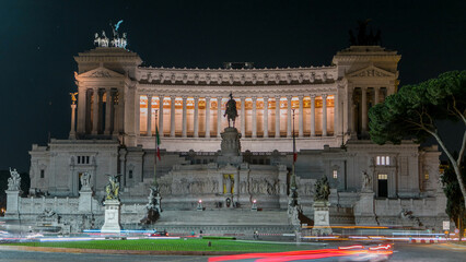 National monument of Victor Emmanuel II at night and road traffic timelapse, Rome