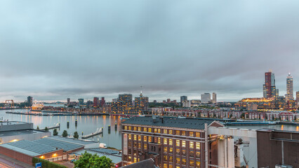 Aerial panoramic view over Maashaven day to night timelapse in Rotterdam.
