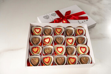 Box of assorted chocolates with the lid open.