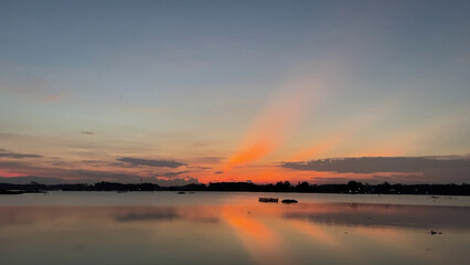 Serene Sunset  Peaceful Waters Reflecting the Golden Hour Glow