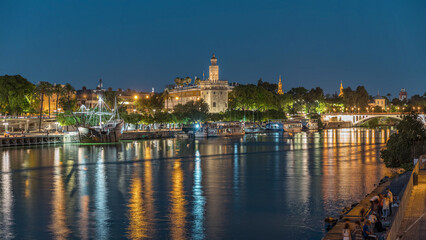 Torre del Oro day to night timelapse on Guadalquivir River in Seville, Spain