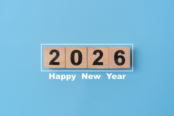 2026 year on wooden block cube for preparation new year change and start new business target strategy concept