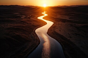 Aerial view of a desert oasis shimmering under the intense light of the afternoon sun