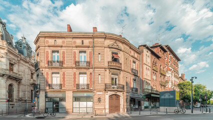 Panorama showing historic brick facades at Rue du Languedoc and Theodore Ozenne intersection...