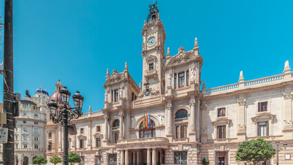 Fototapeta premium Valencia City Hall or Ajuntament de Valencia timelapse hyperlapse in Plaza de Ayuntamiento. Spain
