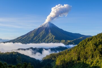 A mountain with a volcano on top and a cloud of smoke rising from it