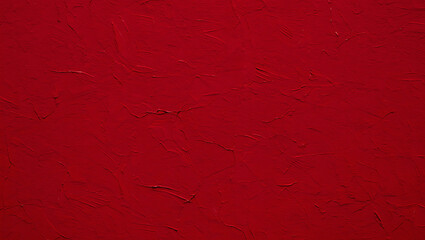 Obraz premium Close up of a textured red wall with minor imperfections and a slightly glossy surface appearance