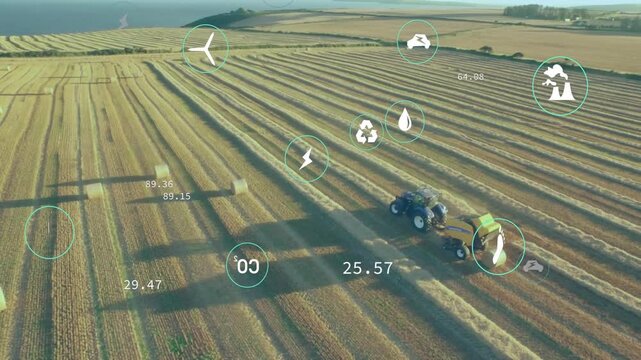 Aerial camera surveying field triggers green tractor with baler making bales, updating data