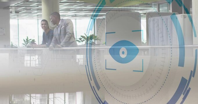 Advancing camera initiating eye icon scan in atrium, revealing colleagues at railing conversing
