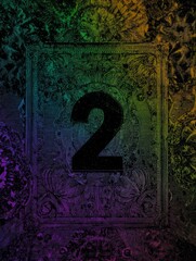 A colorful abstract image with the number 2 in the center