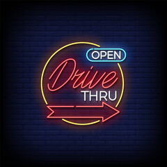 drive thru neon sign with brick wall background vector