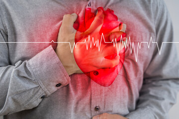 Heart attack warning with man clutching chest and heartbeat graph overlay, concept of medical...