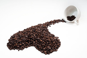 Close-up of roasted brown coffee beans piled together, showcasing rich texture, aroma, and freshness on a white studio background.