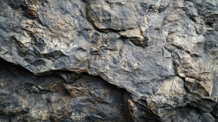 Rough Texture of Grey Mountain Rock Face