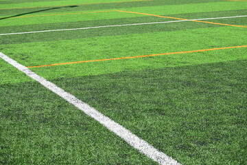 Obraz premium artificial green grass background for playground