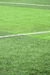 Obraz premium artificial green grass background for playground