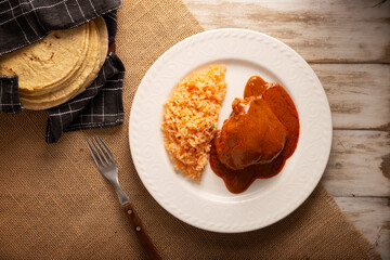 Pipian with Chicken, food from Mexico and other Latin American countries, chicken meat bathed in mole sauce made with pumpkin seeds, dried chili peppers and several other ingredients.