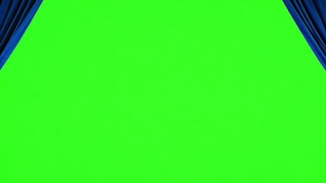 Green Screen Stage: A versatile green screen backdrop framed by elegant blue curtains, offering a professional and adaptable space for visual creation.