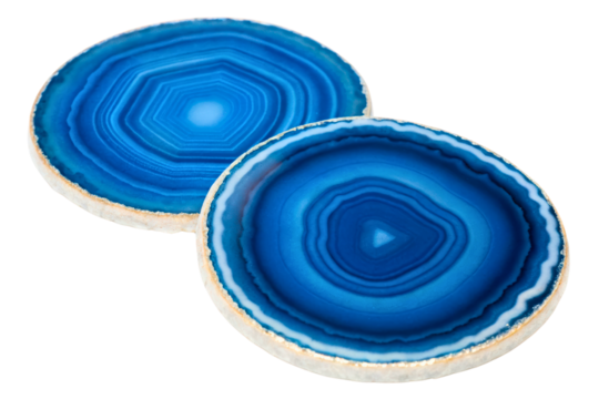 Two vibrant blue circular polished agate stone coasters isolated with transparent background - Powered by Adobe