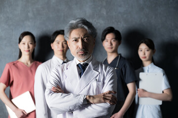 Image of multiple medical teams of doctors and doctors with gray backs and cool gray hair