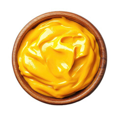 Creamy, golden-yellow sauce in wooden bowl