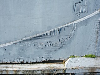 Old military sea minesweeper. Wooden hull of the minesweeper.