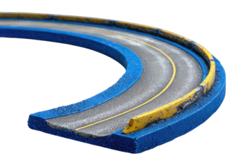 A curved section of a model race track, featuring two lanes separated by a yellow line, blue retaining walls, and a textured asphalt surface.  The edges show a rough, unfinished texture