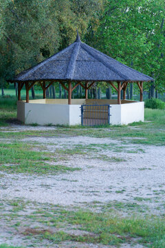 Montejaque,Malaga,Spain Wooden gazebo with thatched roof standing in a park