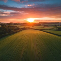 Evening light dances on Devon’s farmland quilt.