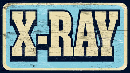 Aged and worn x-ray sign on wood