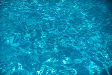 Obraz premium Pool water background, blue wave abstract or rippled water texture background.
