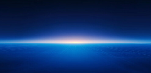 This picture shows a deep blue sky with a warm orange glow on the horizon, creating a peaceful and mysterious atmosphere.