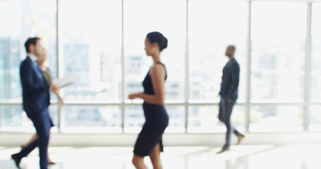 Blur, window and walking with business people in lobby of office for corporate productivity. Busy,...