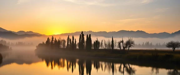 Misty morning sunrise over majestic mountains, silhouetted cypress trees reflected in calm river,  landscape,  river