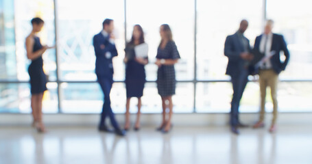 Blur, business people and group in office, conversation and teamwork with accounting. Employees,...