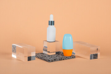 Plastic white tube for cream or lotion. Skin care or sunscreen cosmetic with stylish props on cream...