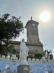 Obraz premium Vietnam, Nha Trang - 02.05.2025 - Mountain Church. Catholic cathedral, French heritage. Religious statues Virgin Mary, Statue of the Mother of God. Holy face of the Virgin Mary. Catholic Christmas in 