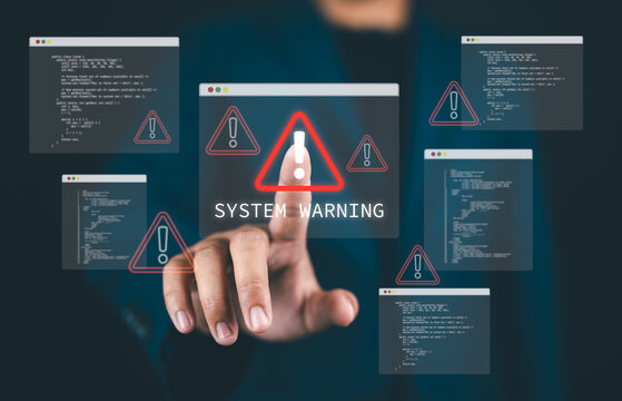 Cybersecurity warning concept with Man pressing virtual alert icon on screen, representing system error, malware risk, and data breach prevention in digital networks and IT infrastructure.