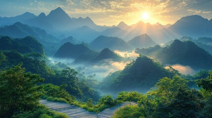 Obraz premium Misty mountain sunrise landscape. Lush valleys, sun rays