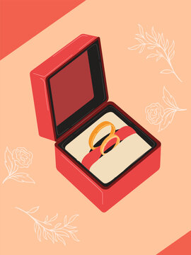 A beautiful open red jewelry box with two gold wedding rings inside, perfect for engagement or marriage celebrations