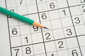 Sudoku puzzle game playing to challenge brain.