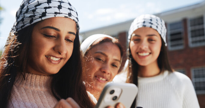 Phone, keffiyeh and activist with friends in city for protest post, human rights and social justice. Palestine relief, community and online support with women outdoor for genocide awareness and peace