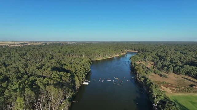 Massive Murray Paddle aerial view of canoes preparing on wide river stretch