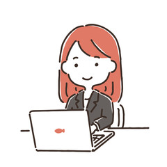 パソコンの前に座っているスーツ姿の若い女性