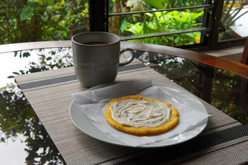 Typical Costa Rican breakfast: tortilla with custard and coffee or tortilla con natilla