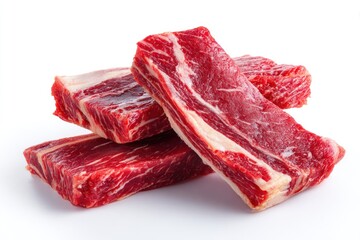 Fototapeta premium Fresh Raw Beef Short Ribs Piled on a White Background