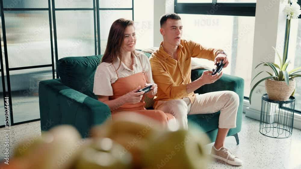 Poster playing, games and fun for couple with controller, home and cheating for next level, love or online.